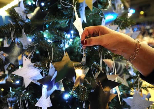 jpco-5-12-12 St Catherines Hospice Tree of Light remembrance service 2012 (Pic by Jon Rigby) ENGPNL00120131129124621