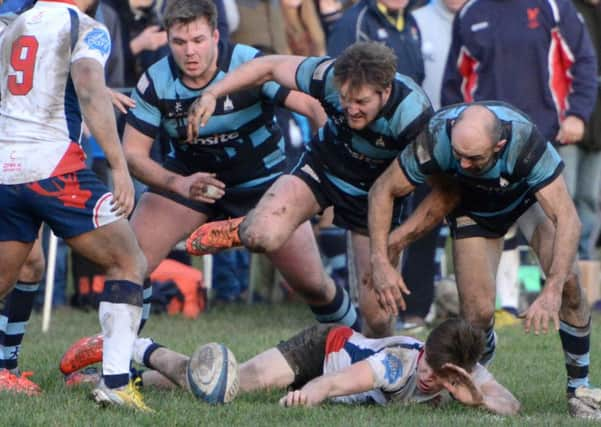 Ben Polhill, Jack Bentall and Tom Belcher battle for the ball in Chichester's win over CS Rugby 1863   Picture by Derek Martin