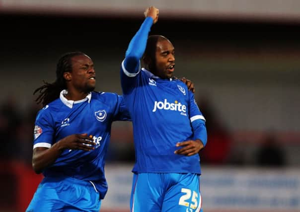 Nigel Atangana celebrates his goal with Marcus Bean, left. Picture: Joe Pepler