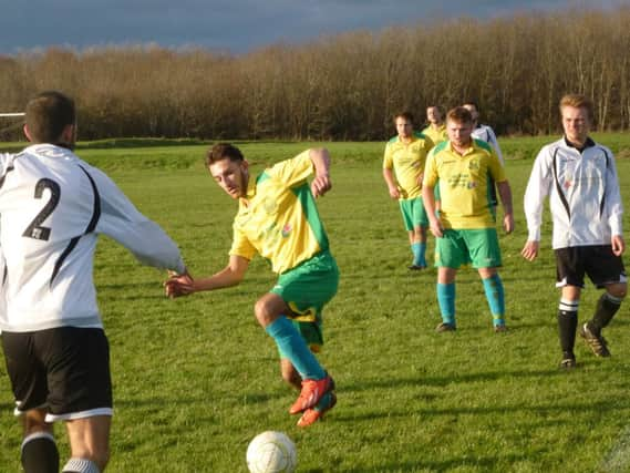 Action from the Macron East Sussex Football League Division Four match between Bexhill United III and Westfield III on Saturday. Picture by Simon Newstead (SUS-141221-122602002)