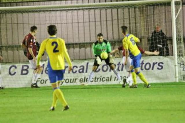 Action from Hastings United's most recent outing against Burgess Hill Town in the Parafix Sussex Senior Challenge Cup on Monday, last week. Picture courtesy Joe Knight