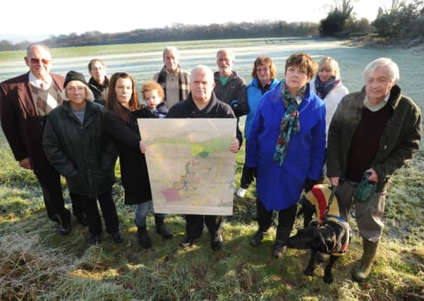 jpco 21-1-15 Residents opposed to the new housing development next to Rusper Road in Ifield (Pic by Jon Rigby) SUS-150120-111519001