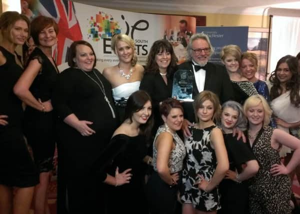 Q Hair and Beauty won Employer of the Year at The Observer and Gazette Business Awards 2014 SUS-140404-231328001