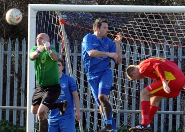 Selsey keeper Karl Walton and defender Stewart Morey   Picture by Louise Adams