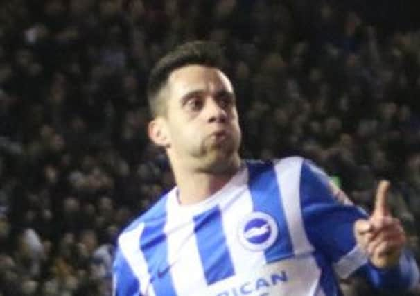 Sam Baldock celebrates scoring against Arsenal.