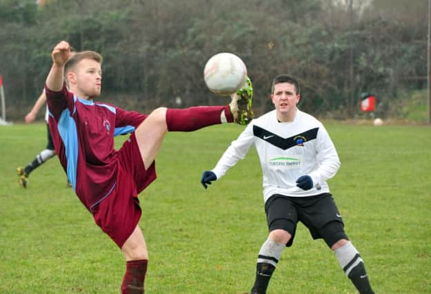 Action from the Macron East Sussex Football League Division Four game between Little Common III and West Hill United. Picture by Steve Hunnisett (SUS-150131-162923002)