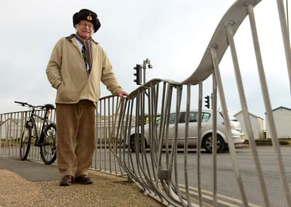 WH 040215 Bent railings that Andrew Eggington has fought to get fixed, at the traffic lights, bottom of Western Road, Lancing.Photo by Derek Martin SUS-150402-082634001