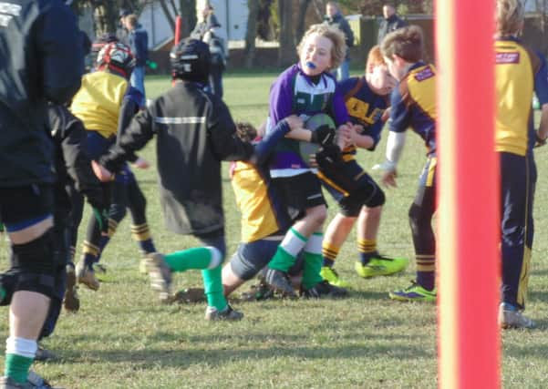 Bognor under-tens in action against Worthing