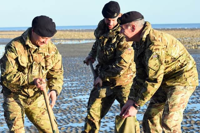 The bomb disposal unit prepare the detonation site