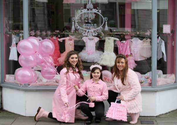 Dawn Ellman-Baker with her daughters Chloe and Sienna