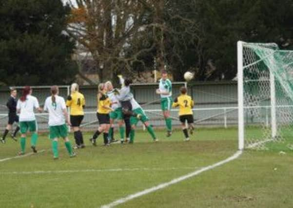 Taylor McGlashan, pictured scoring last season, was vital in the draw at Swindon