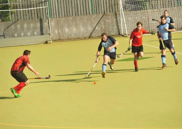 Dan Burnett on the ball for South Saxons during their 2-2 draw at home to Southwick. Picture by Simon Newstead (SUS-150903-150923002)