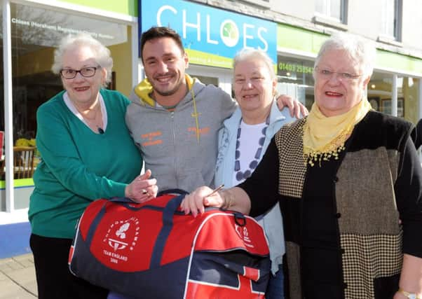 JPCT 060315 S15081451x Team GB diver Blake Aldridge donating kit to Chloe's Charity Shop, Horsham -photo by Steve Cobb SUS-150603-102346001