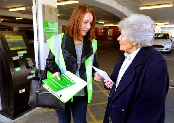 Leaflets are being handed out after complaints over new Smart Park system in Piries Place car park. Pic Steve Robards SUS-150324-160223001