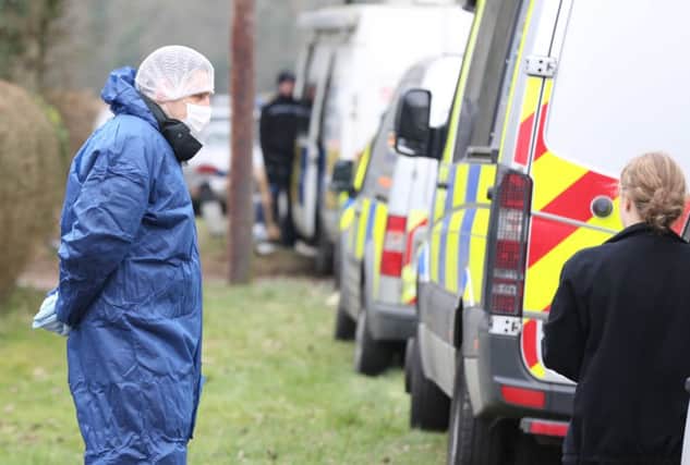 The scene where a woman's body was found in a burning car in Ifield. Picture by Eddie Mitchell SUS-150318-172534001