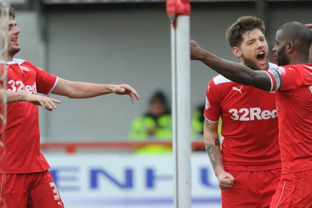 Izale McLeod scores from the penalty spot to give Crawley the all important victory over Leyton Orient (Pic by Joe and James Rigby) SUS-150321-212622002