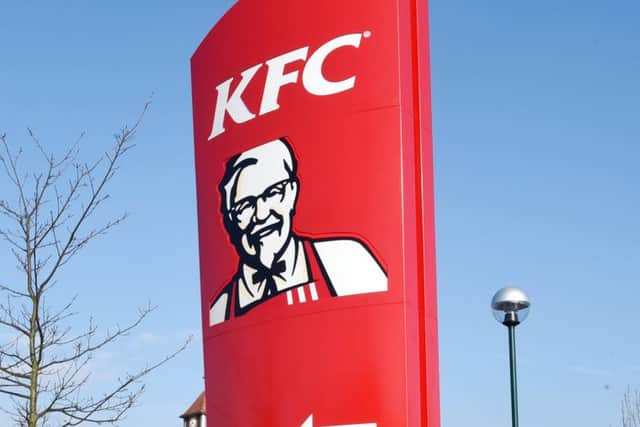 GV of KFC (Kentucky Fried Chicken) sign in Waitrose car park. Burgess Hill. Sussex. 

Picture: Liz Pearce
LP1500597 SUS-150323-194653008