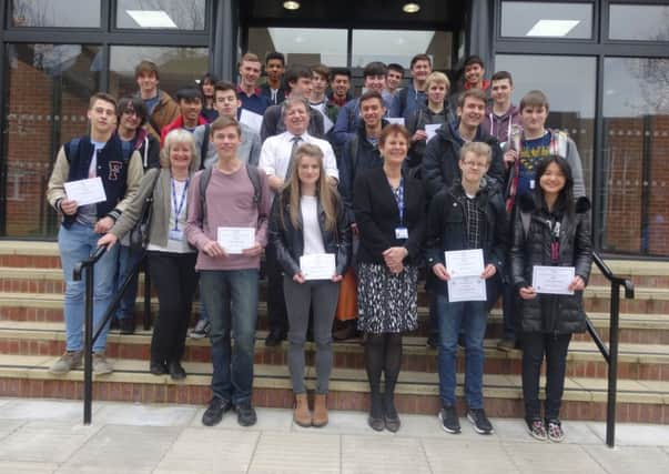 Certificate winners with their teachers and principal Sally Bromley (centre). Picture bystudent reporter Hannah Cruz SUS-150104-163712001