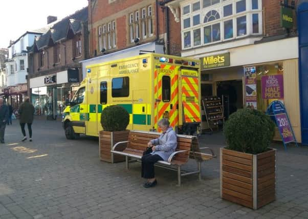 Ambulance in West Street outside Milletts SUS-150704-141854001