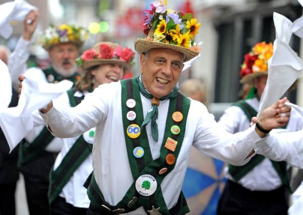 JPCT 100514 S14200810x  Horsham town centre,  Day of Dance. The Broadwood Morris Mens Day of Dance 2014.  -photo by Steve Cobb SUS-141005-120725001