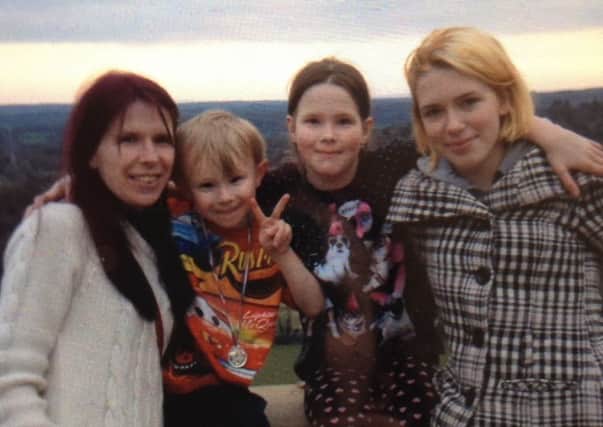 Lindsay Reed with her children Jamie, five, Samantha, nine, and Megan, 14