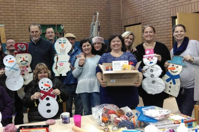 ARK Horsham family say thank you to County Times readers for supporting them through the Caring Christmas Campaign 2014 - picture by Anna Coe SUS-150121-131359001