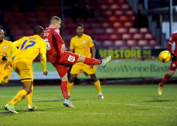 Lee Fowler scores the all important winner for Crawley Town against Preston North End (Pic by Jon & Joe Rigby) PPP-150302-090507004