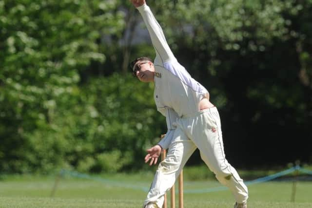 Jed O'Brien bowling for Hastings Priory in their defeat at Three Bridges last weekend. Picture by Jon Rigby (SUS-150518-100641008)