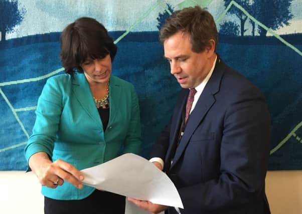 Rail Minister Claire Perry with Horsham MP Jeremy Quin