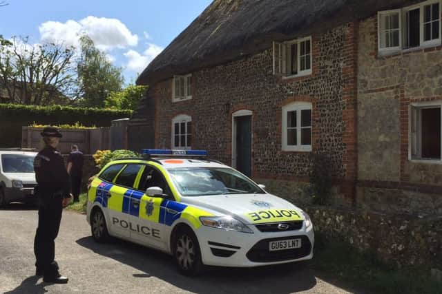 Police outside the site of the fire SUS-150606-132449001