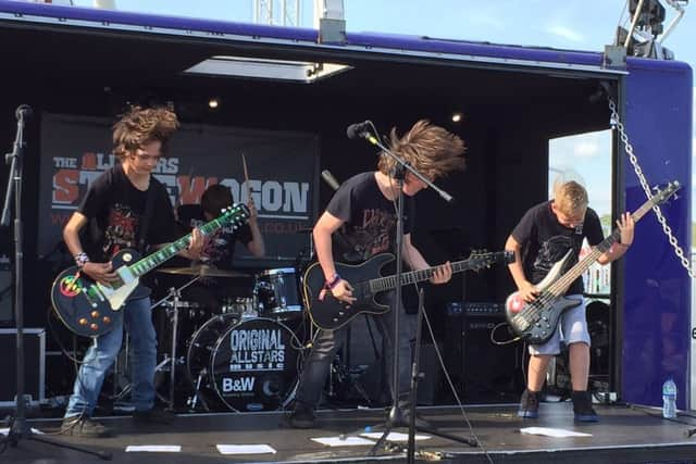 The young rockers from Deaf Cattle performing at Wild Life Festival in Shoreham SUS-150706-190142001