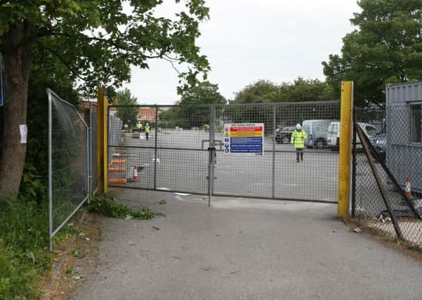 DM1506406a.jpg Former Queen Street car park in Worthing. Work has begun to install temporary classrooms. Photo by Derek Martin SUS-150906-171110008