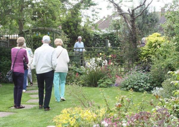 Visitors enjoy the gardens SUS-150615-160820001