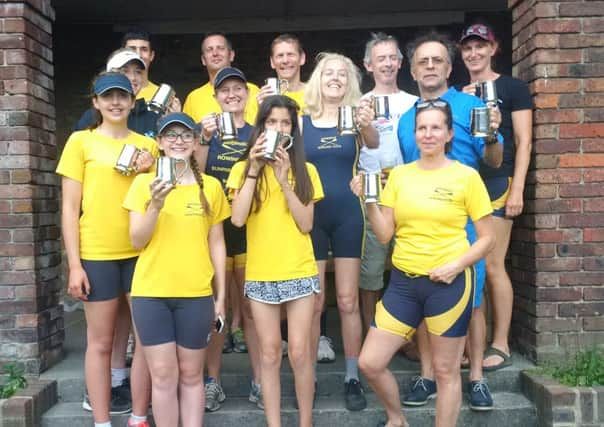 Most of the Ardingly winners with their pots at Richmond Regatta