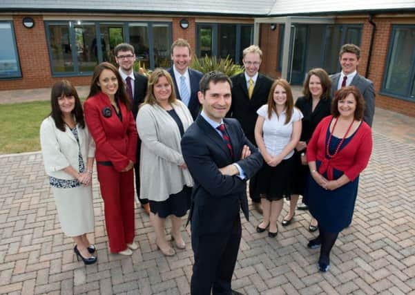 Guy Martyn (centre) as the Free School prepared to open in 2013