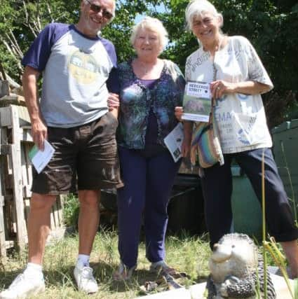 DM1511801a Chris and Tine Everson with Merry Curd, right, in Hedgehog Corner