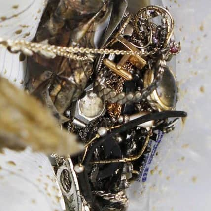 A range of jewellery found by the police divers