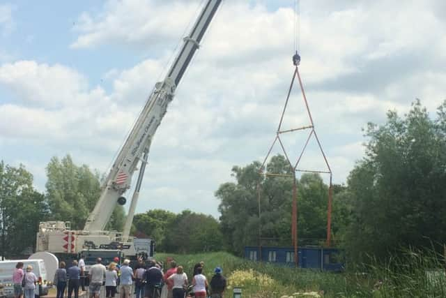 The houseboat being removed from Chichester Marina. Social services are now trying to help her