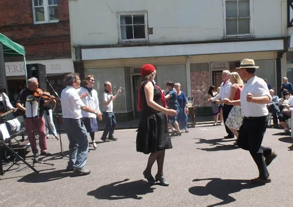 Dansez Francais entertain at the St Nicolas Church fete and flower festival