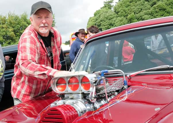 1066 Cruisers Hot Rod and Classic Car show, Horns Corner Field, Catsfield.
07.08.11.
Picture by: TONY COOMBES PHOTOGRAPHY
Steve Bradshaw with his 1966 MK1 Cortina ENGSNL00120110808114945