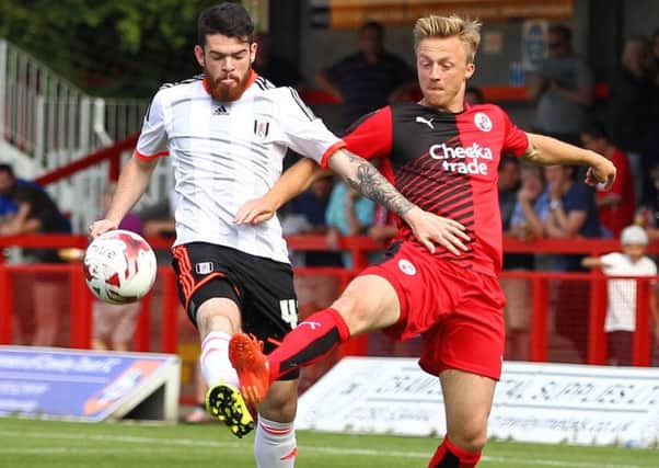 Liam Donnelly, left, in action for Fulham against Crawley Town during their pre-season friendly on July 18, 2015 SUS-150731-165852002