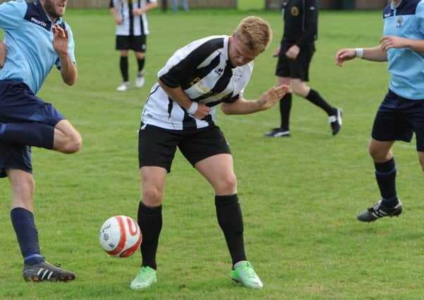 Charlie Pitcher in action for St Francis Rangers