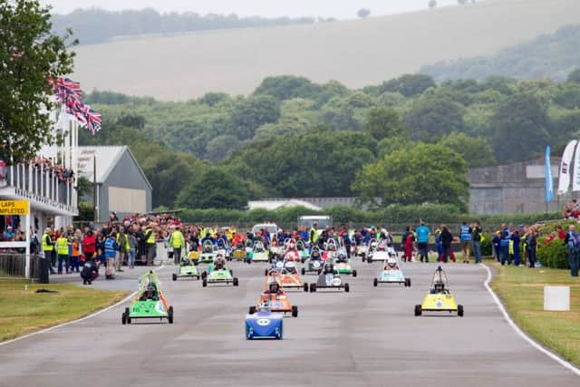 Blue Peter presenters Barney Harwood and Radzi Chinyanganya racing at the 2015 Gathering of Goblins