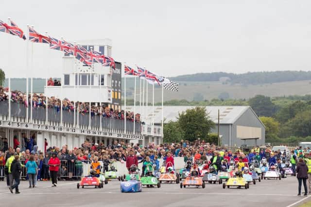 Blue Peter presenters Barney Harwood and Radzi Chinyanganya racing at the 2015 Gathering of Goblins