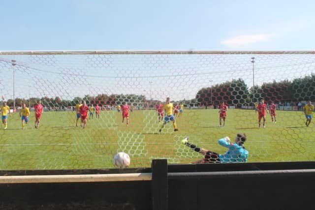 Joe Keehan calmly slots home the penalty at Needham Market. Picture by Colin Bowman