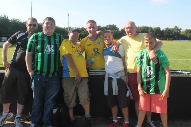 Pat Harding celebrates with travelling support. Picture by Colin Bowman