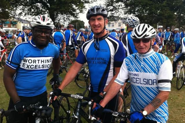 Conrad Cornelius, Eric Baker and Peter Weston paying their respects SUS-151208-142035001