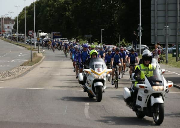 Procession of cyclists, including members of the Worthing Excelsior Cycling Club, accompany the coffin of great-grandfather Don Lock ahead of his funeral at Worthing Crematorium. PRESS ASSOCIATION Photo. Issue date: Wednesday August 12, 2015. Lock, a keen cyclist, was stabbed to death in an alleged road rage attack following a collision involving his car and another vehicle on the A24 at Findon, near Worthing, West Sussex, on July 16. See PA story FUNERAL Lock. Photo credit should read: Yui Mok/PA Wire