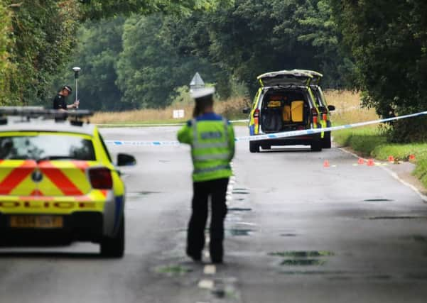 Police a stretch of the B2146 between Funtington and East Ashling after a fatal crash. Picture by Eddie Mitchell