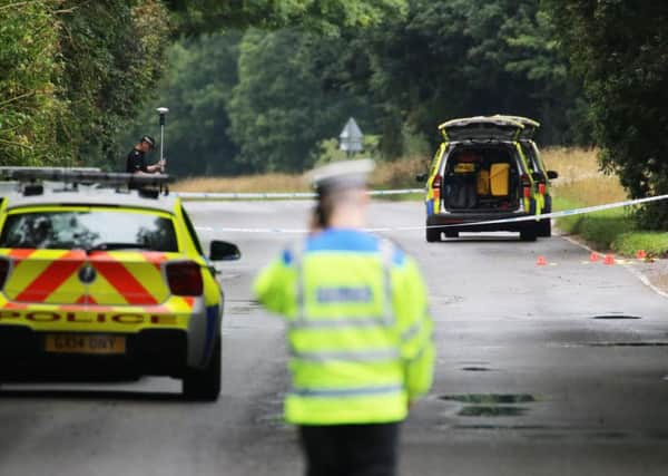 Police a stretch of the B2146 between Funtington and East Ashling after a fatal crash. Picture by Eddie Mitchell